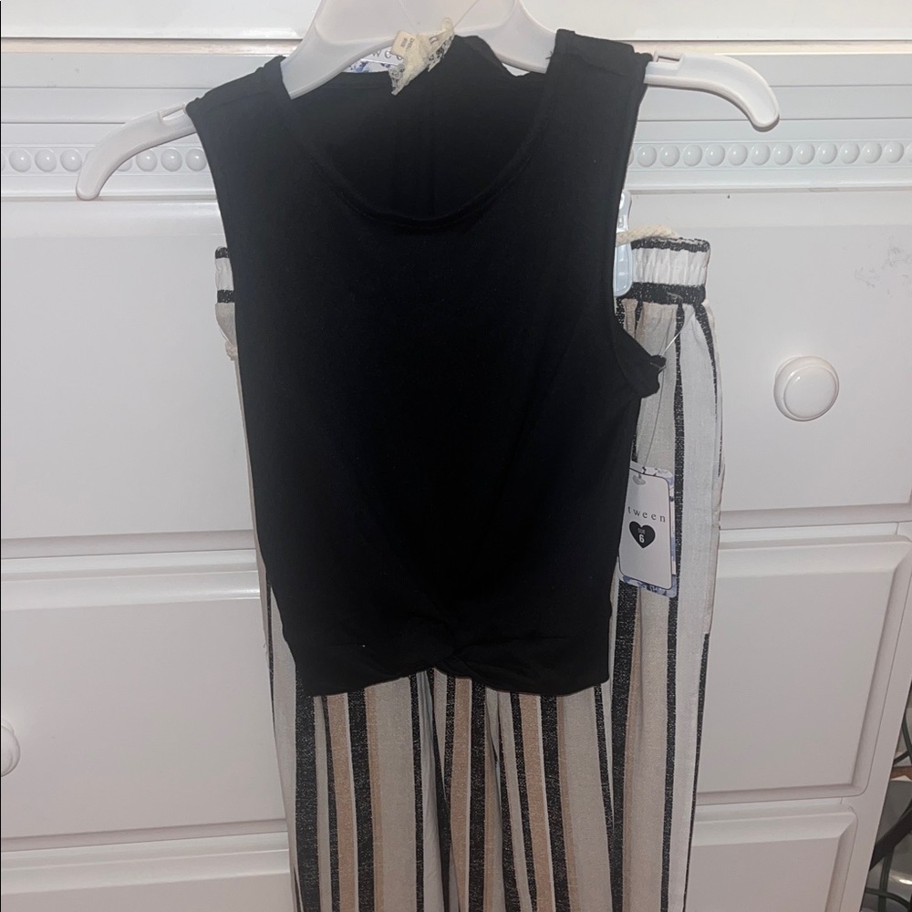 Black Sleeveless Top with Striped Pants